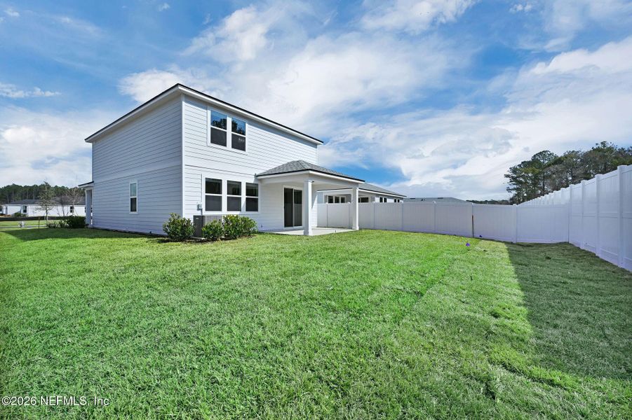 Exterior details and patio area of a home in Murray Farms, Middleburg (Image 4).