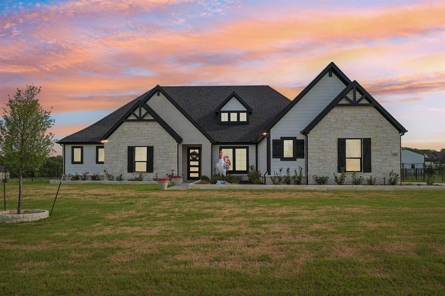 Front exterior of a new home in King Crossing Estates, Van Alstyne, TX, highlighting curb appeal (Image 20). Front exterior of a new home in King Crossing Estates, Van Alstyne, TX, highlighting curb appeal (Image 20).