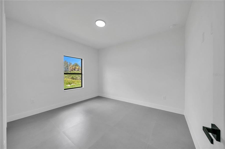 Spacious, unfurnished interior of a new home in , North Port (Image 18).