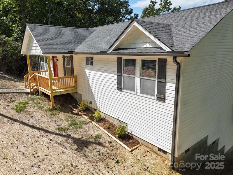Front exterior of a new home in , Etowah, NC, highlighting curb appeal (Image 22).