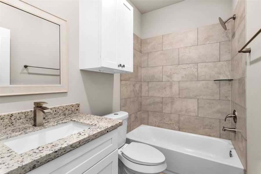 Furnished interior view inside a new home in , Willis (Image 12).