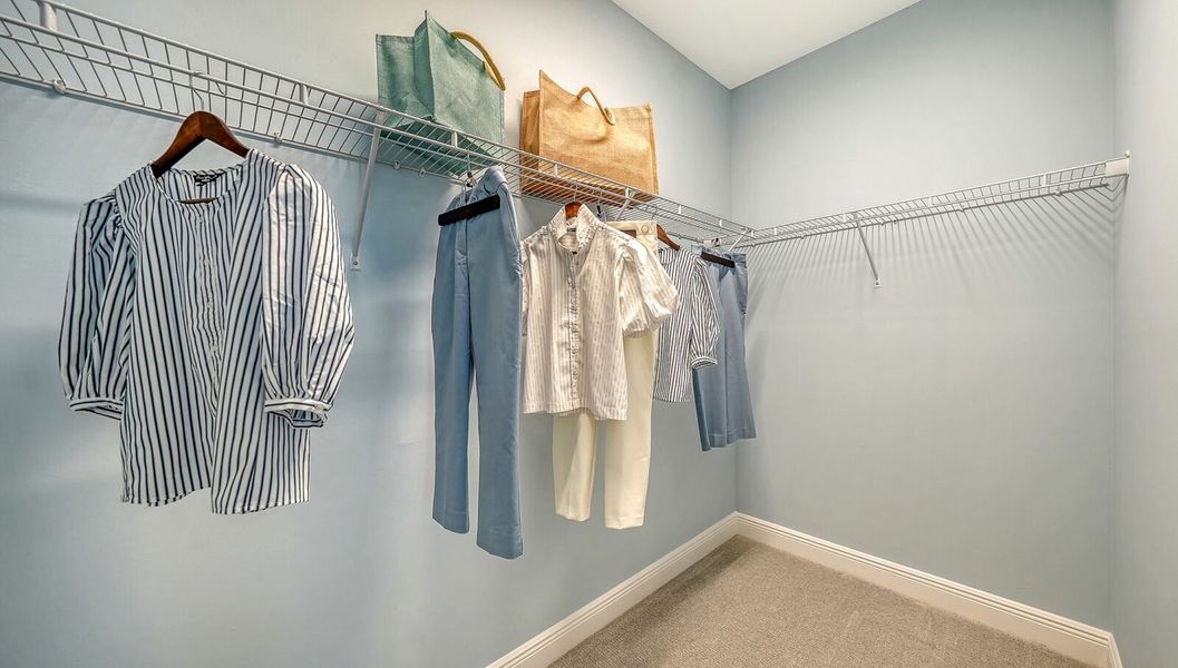 Representative interior finishes for a home built from the Parker by Neal Communities in SkySail, Naples (Image 21).