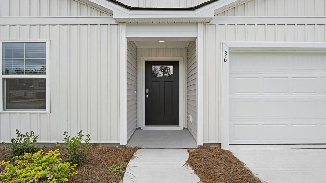 Representative exterior details of a home built from the Freeport by D.R. Horton in The Groves at Bees Creek, Ridgeland (Image 3).