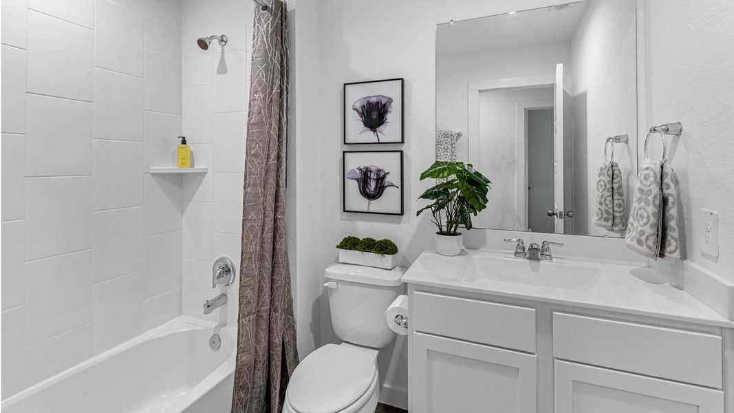 Representative photo. The second floor is designed for comfort and flexibility, highlighted by a spacious primary suite with a well-appointed bath that includes a separate shower and tub. Two additional bedrooms easily accommodate guests, while a central flex space creates endless possibilities for a game room, second living area, or personalized retreat. Representative photo. The second floor is designed for comfort and flexibility, highlighted by a spacious primary suite with a well-appointed bath that includes a separate shower and tub. Two additional bedrooms easily accommodate guests, while a central flex space creates endless possibilities for a game room, second living area, or personalized retreat.