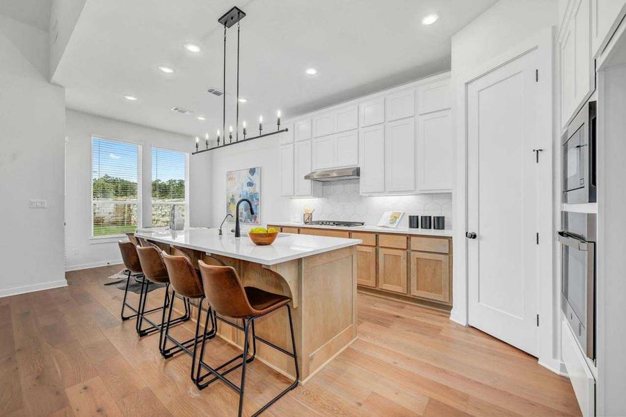 Representative furnished interior of a home built from the Richmond.535 by Highland Homes in Riceland, Mont Belvieu (Image 5).