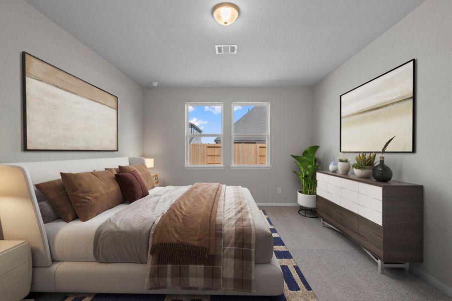 The primary bedroom is generously sized, creating a tranquil and spacious retreat that offers ample room for relaxation. Featuring plush carpet, high ceilings, fresh paint, and large windows that lets in natural lighting throughout the day.