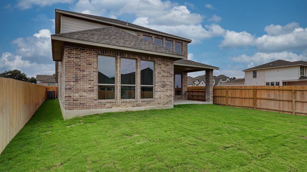 Exterior details and patio area of a home in Kallison Ranch, San Antonio (Image 26).