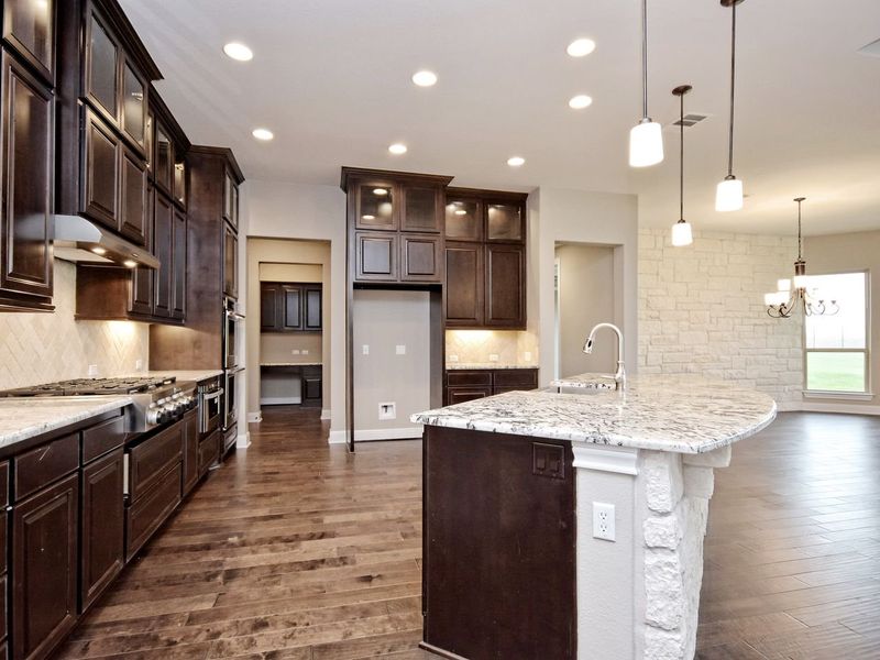 Representative furnished interior of a home built from the Madera II by Giddens Homes in Scofield Farms Estates, Georgetown (Image 215).