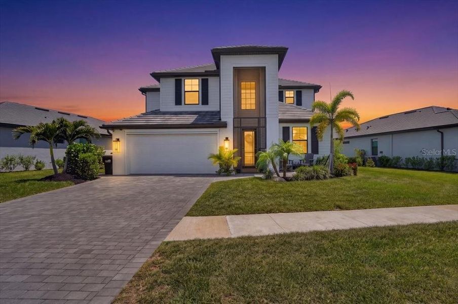 Front exterior of a new home in , Venice, FL, highlighting curb appeal (Image 1). Front exterior of a new home in , Venice, FL, highlighting curb appeal (Image 1).