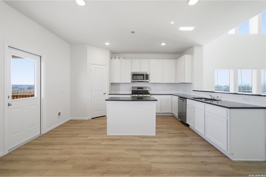 Furnished interior view inside a new home in Hickory Ridge, Elmendorf (Image 8).