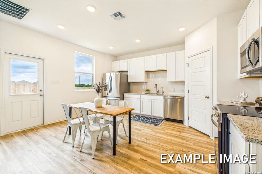 Furnished interior view inside a new home in Agave, San Antonio (Image 5).