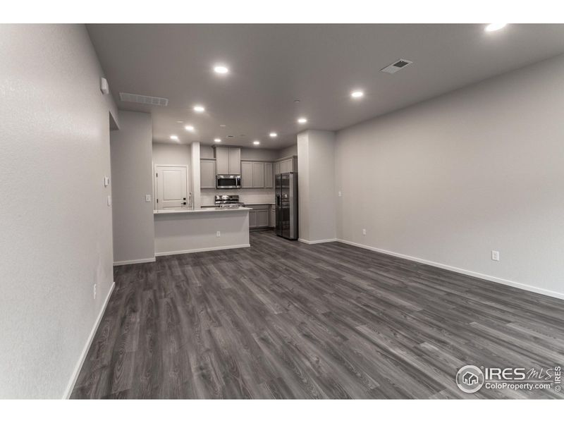 LIVING ROOM, DINING ROOM AND KITCHEN