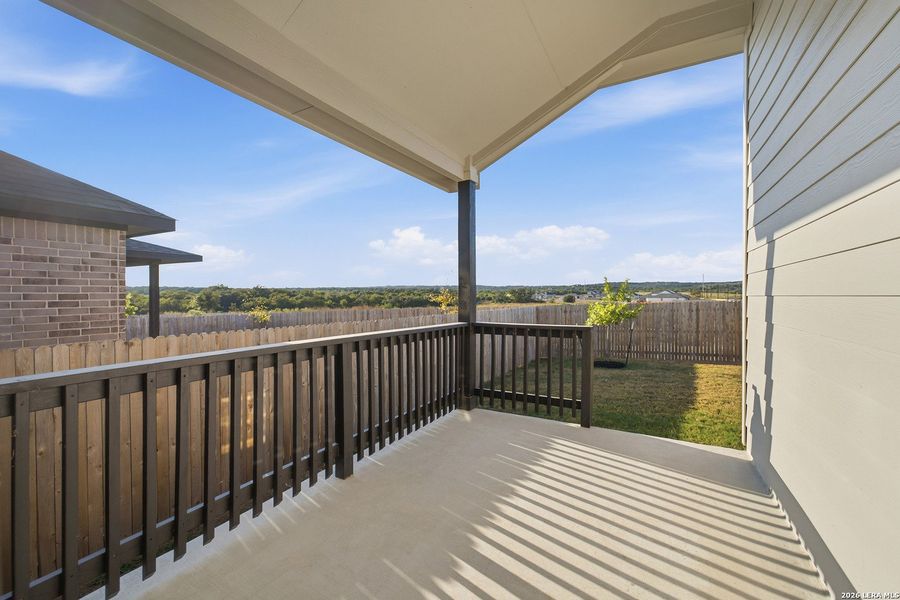 Exterior details and patio area of a home in The Woodlands at Medina Hills, Mico (Image 3). Exterior details and patio area of a home in The Woodlands at Medina Hills, Mico (Image 3).