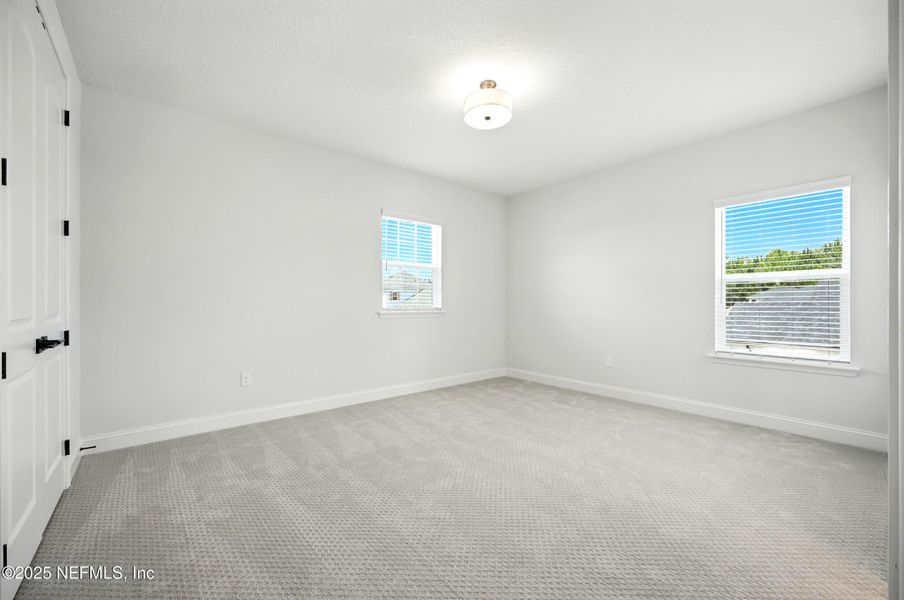 Spacious, unfurnished interior of a new home in Silver Landing At Silverleaf, St. Augustine (Image 37).