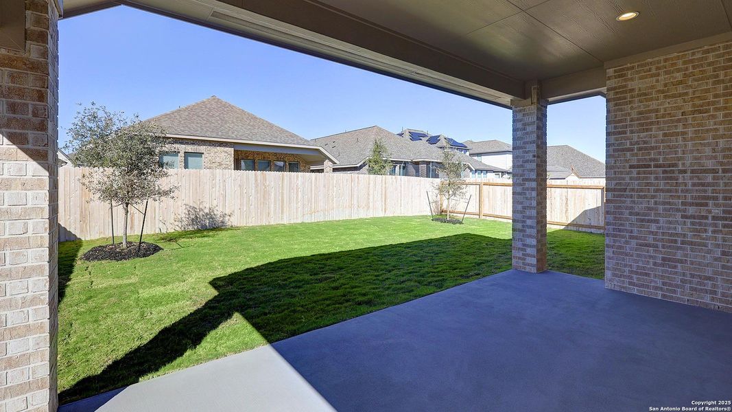 Exterior details and patio area of a home in Kallison Ranch 50', San Antonio (Image 4).