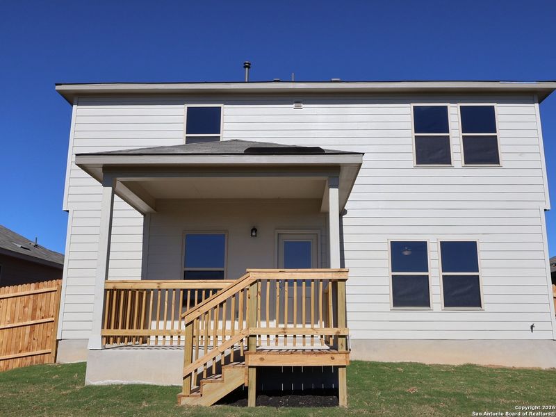 Exterior details and patio area of a home in Hunters Ranch, San Antonio (Image 21).