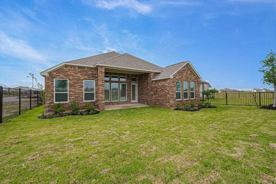 Representative exterior photo of a completed home built from the Floor Plan 2620 by Colina Homes in Woodland Lakes, Huffman, TX (Image 30). Representative exterior photo of a completed home built from the Floor Plan 2620 by Colina Homes in Woodland Lakes, Huffman, TX (Image 30).