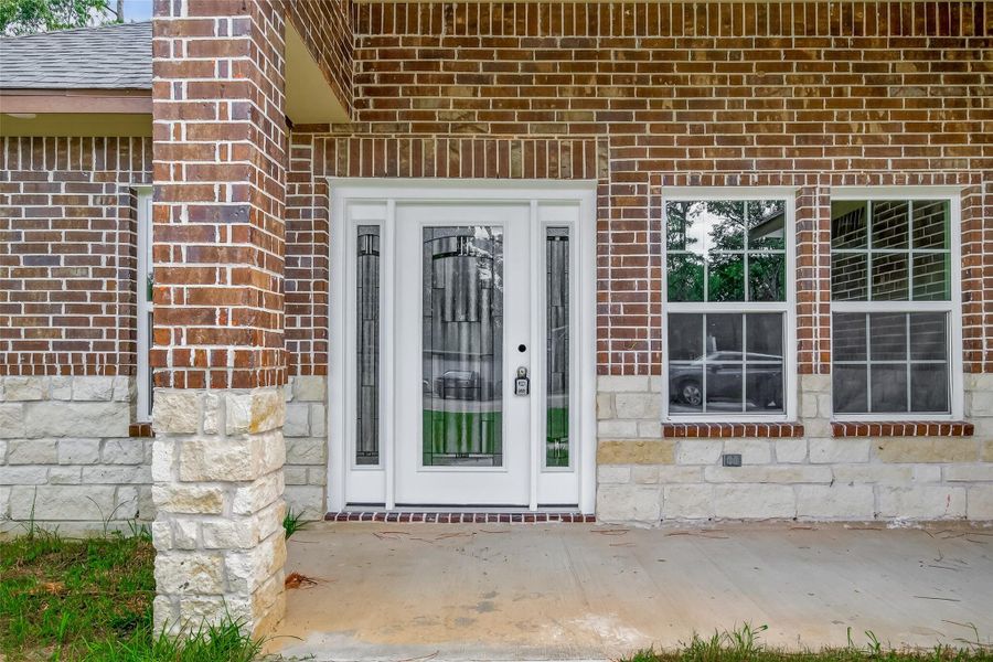 Front exterior of a new home in , Crosby, TX, highlighting curb appeal (Image 16).