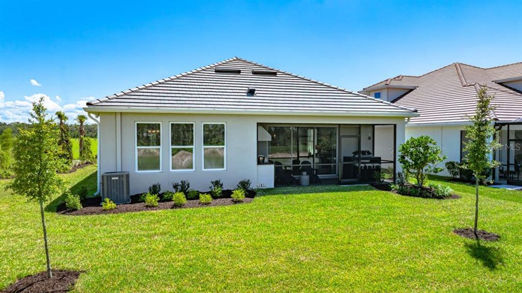 Exterior details and patio area of a home in Hammock at Two Rivers, Zephyrhills (Image 2).