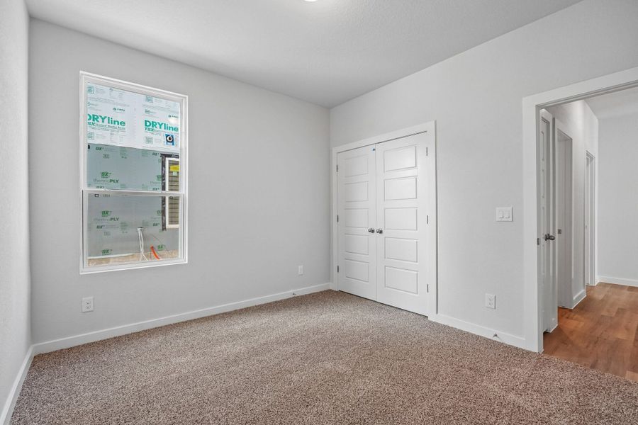 Spacious, unfurnished interior of a new home in The Meadows at Hunters Ranch, San Antonio (Image 42).
