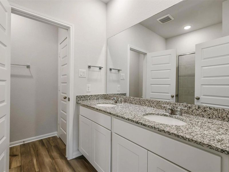 Furnished interior view inside a new home in Caney Creek Place, Conroe (Image 9).