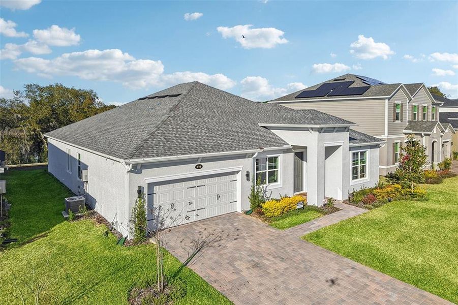Front exterior of a new home in , Apopka, FL, highlighting curb appeal (Image 26).