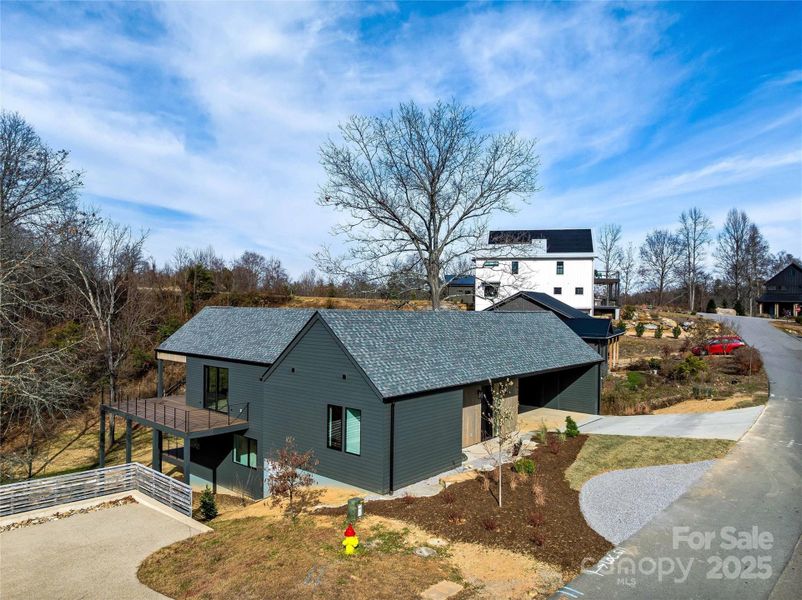 Front exterior of a new home in , Asheville, NC, highlighting curb appeal (Image 1).