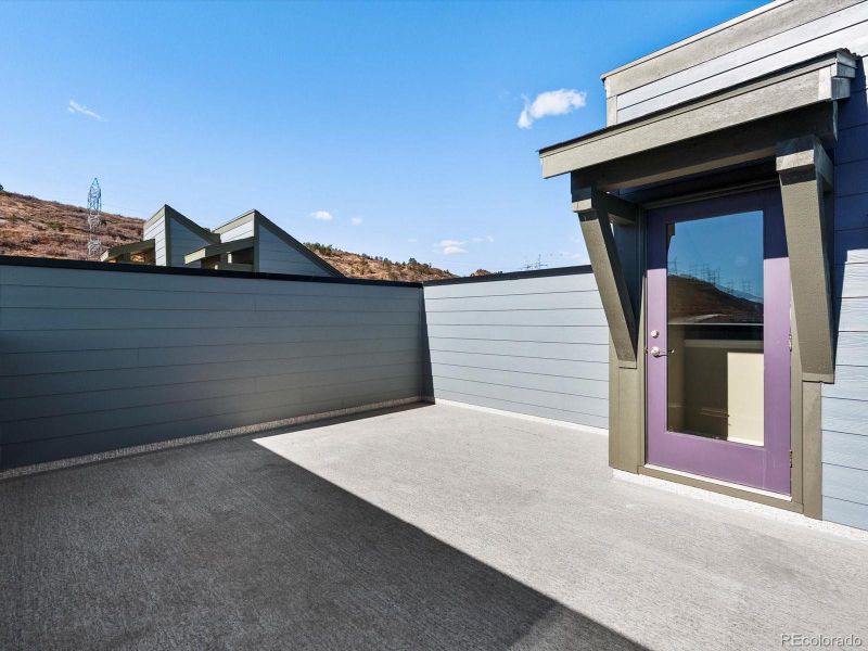 Exterior details and patio area of a home in Three Hills, Morrison (Image 23).