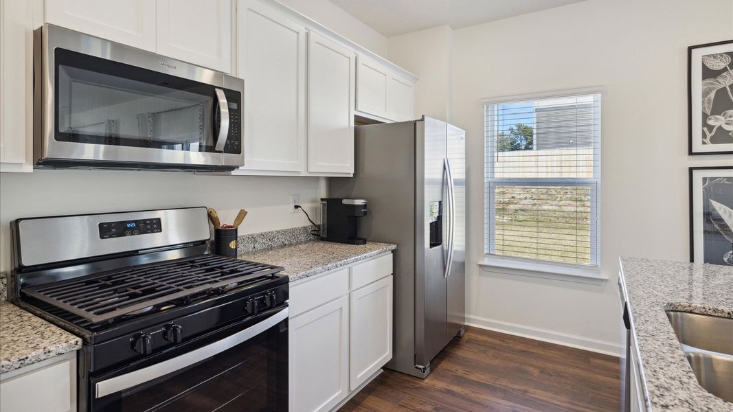 Representative furnished interior of a home built from the Penwell by D.R. Horton in Millstone Village, Morristown (Image 7).