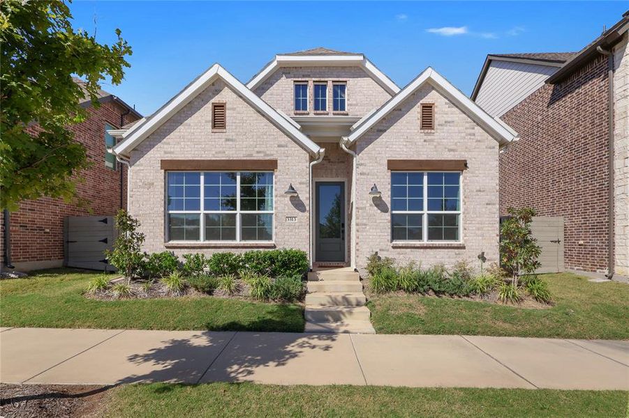 Front exterior of a new home in , Sachse, TX, highlighting curb appeal (Image 1). Front exterior of a new home in , Sachse, TX, highlighting curb appeal (Image 1).