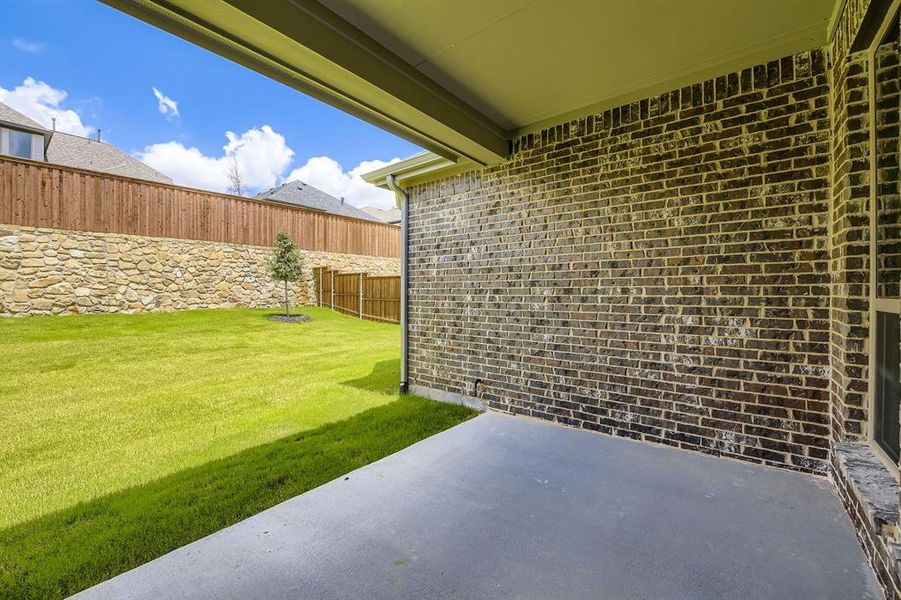 View of yard featuring a patio View of yard featuring a patio