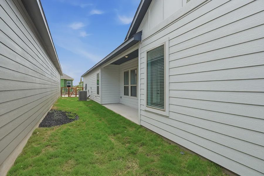 Exterior details and patio area of a home in The Crossvine, Schertz (Image 25).