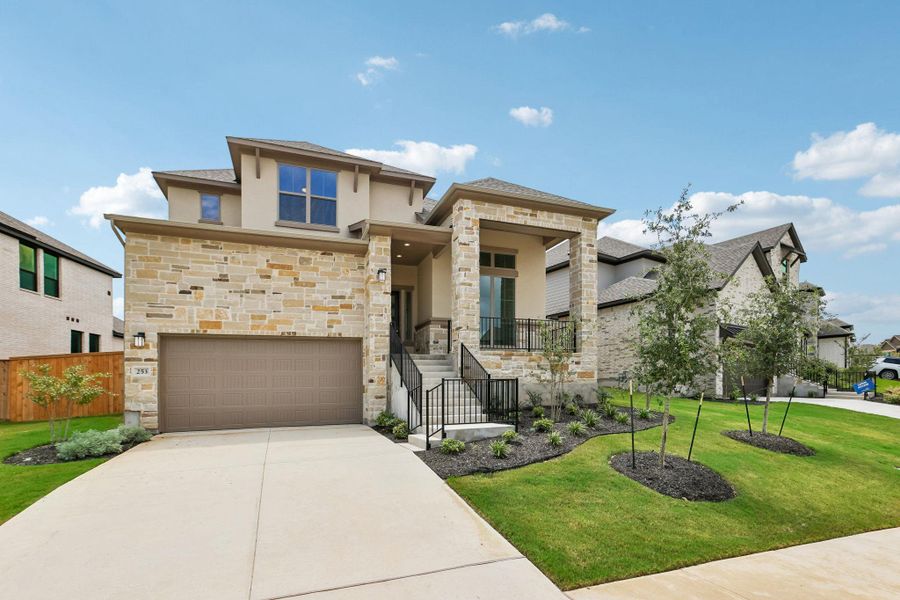 Front exterior of a new home in 6 Creeks, Kyle, TX, highlighting curb appeal (Image 1). Front exterior of a new home in 6 Creeks, Kyle, TX, highlighting curb appeal (Image 1).