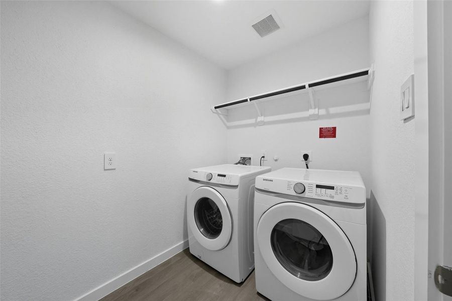 A dedicated laundry room helps provide some extra space and storage for laundry needs and cleaning supplies.