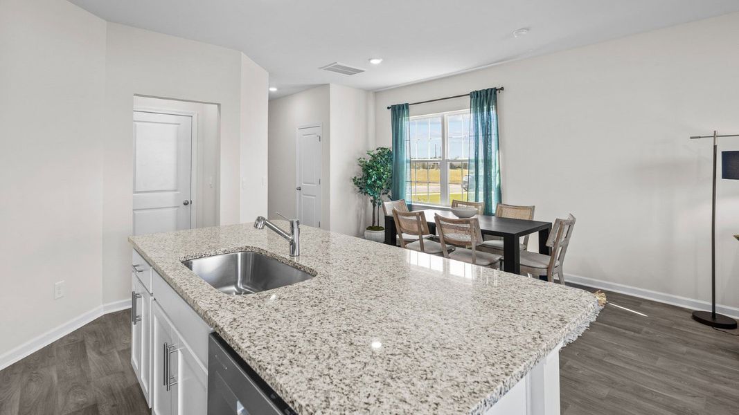 Furnished interior view inside a new home in The Townes at Ridgewood Farms, Winterville (Image 6). Furnished interior view inside a new home in The Townes at Ridgewood Farms, Winterville (Image 6).