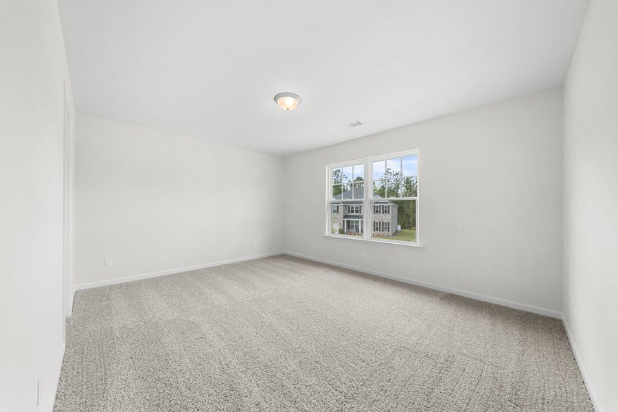 Representative unfurnished interior of a home built from the The Madison by Smith Family Homes in Camden Crossing, Savannah (Image 28).