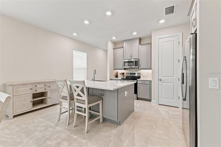 Furnished interior view inside a new home in , Poinciana (Image 7).