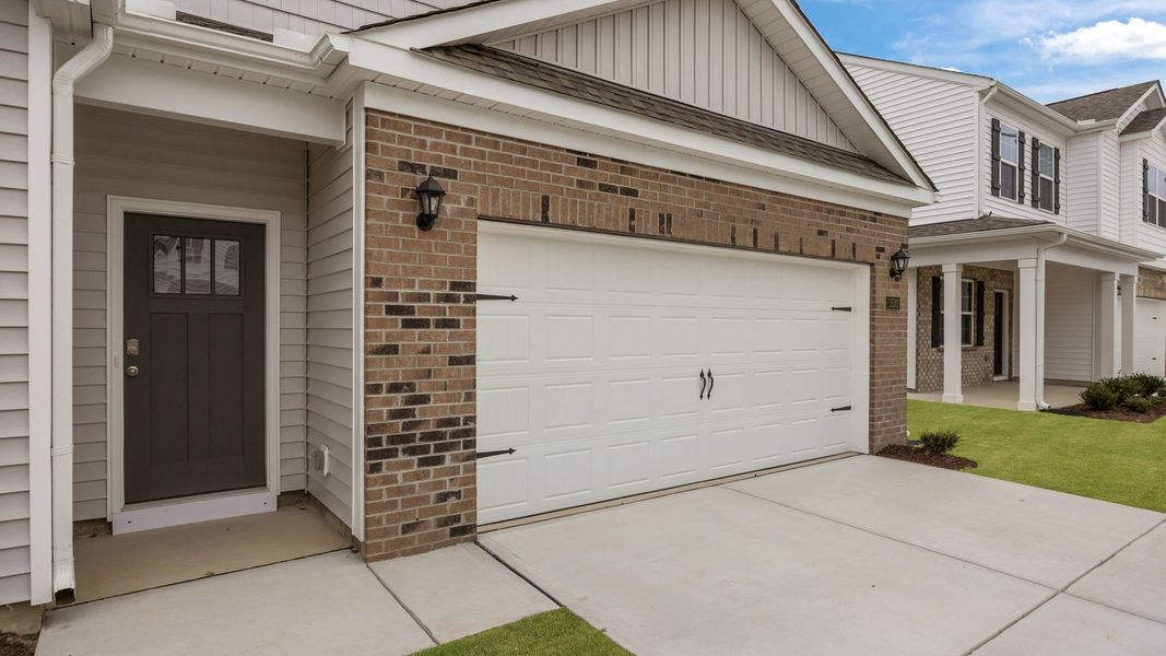 Exterior details and patio area of a home in Ridgewood Farms, Winterville (Image 3).