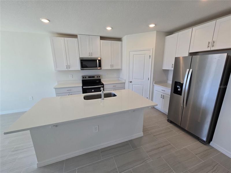 Spacious, unfurnished interior of a new home in Magnolia Bay - Classic Series, Nokomis (Image 22).