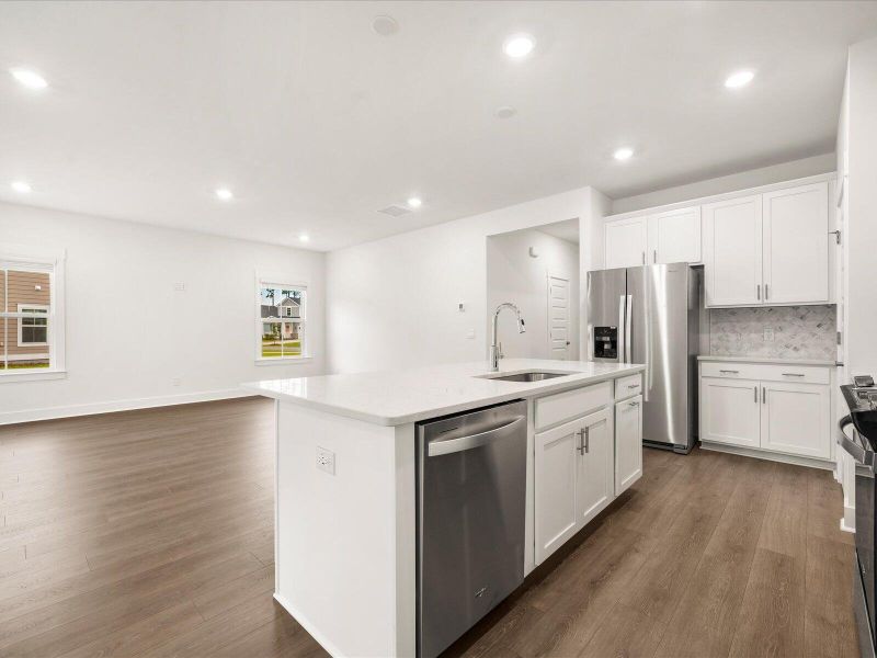 Furnished interior view inside a new home in The Coves at Lakes of Cane Bay, Summerville (Image 10).