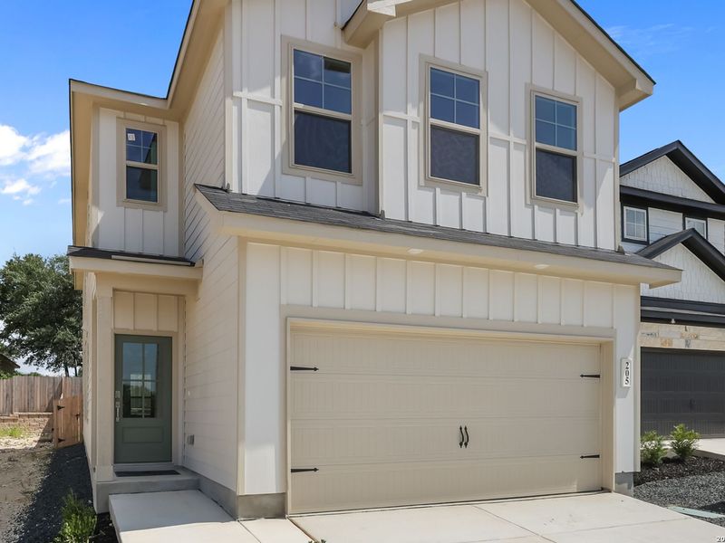 Front exterior of a new home in Meadows at Oak Creek, San Antonio, TX, highlighting curb appeal (Image 2). Front exterior of a new home in Meadows at Oak Creek, San Antonio, TX, highlighting curb appeal (Image 2).