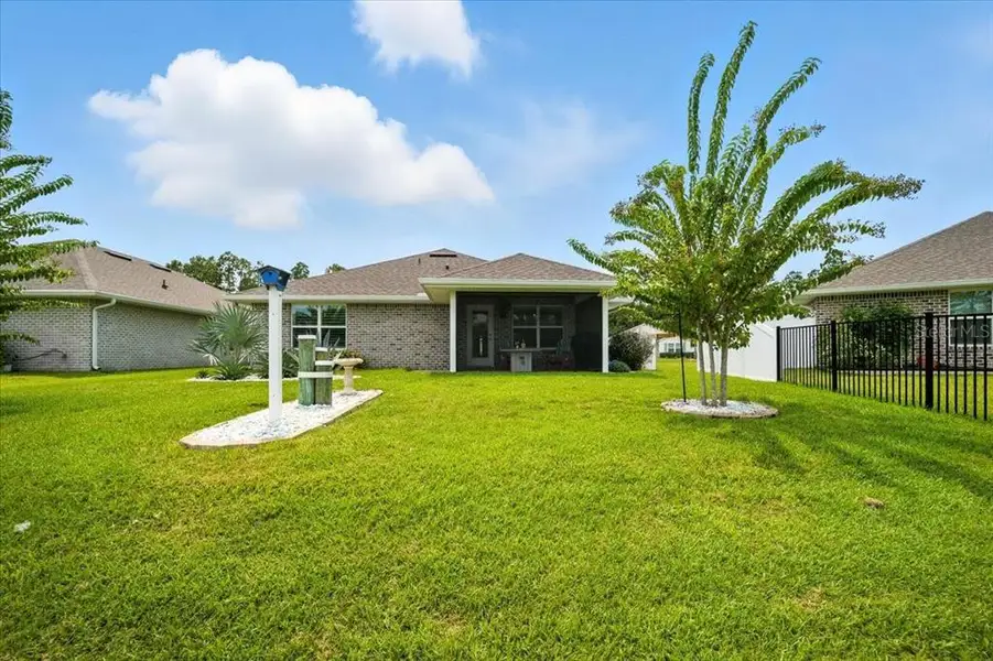 Front exterior of a new home in Sawmill Creek at Palm Coast Park, Palm Coast, FL, highlighting curb appeal (Image 19).
