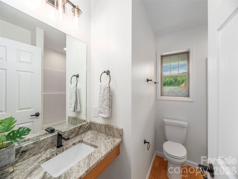 Furnished interior view inside a new home in , Waynesville (Image 15).