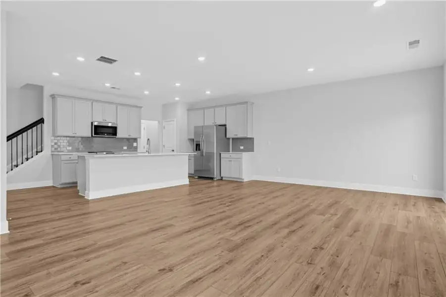 Spacious, unfurnished interior of a new home in Towns at Holly Springs, Holly Springs (Image 19). Spacious, unfurnished interior of a new home in Towns at Holly Springs, Holly Springs (Image 19).