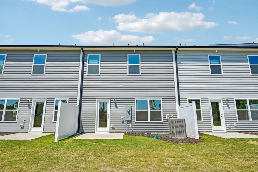 Exterior details and patio area of a home in Towns at The Point, Rolesville (Image 21).