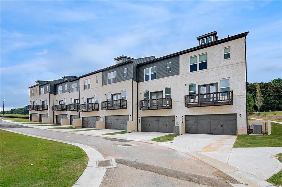 Front exterior of a new home in Daybreak, Newnan, GA, highlighting curb appeal (Image 18).