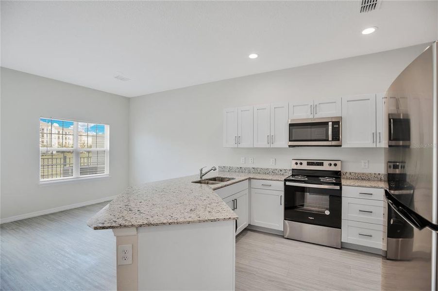 Furnished interior view inside a new home in , Kissimmee (Image 5).