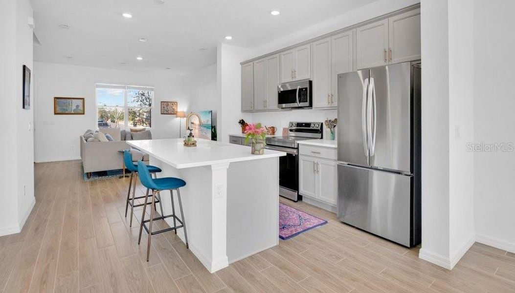 Furnished interior view inside a new home in Northlake at Ovation, Winter Garden (Image 11).