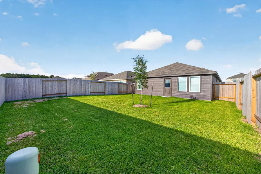 Exterior details and patio area of a home in , Houston (Image 4).