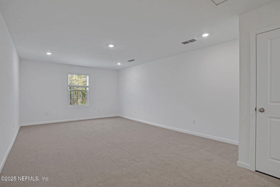 Spacious, unfurnished interior of a new home in Cordova Palms, St. Augustine (Image 36).